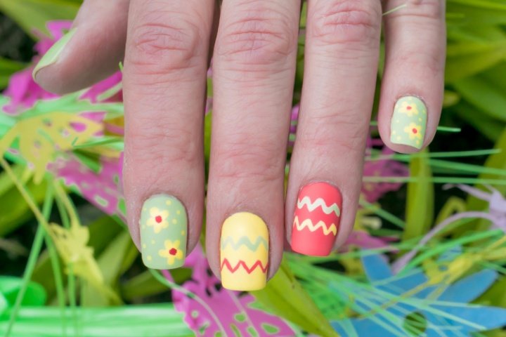 Cute easter nail designs featuring pastel colors, bunny art, and spring flowers perfect for the season.