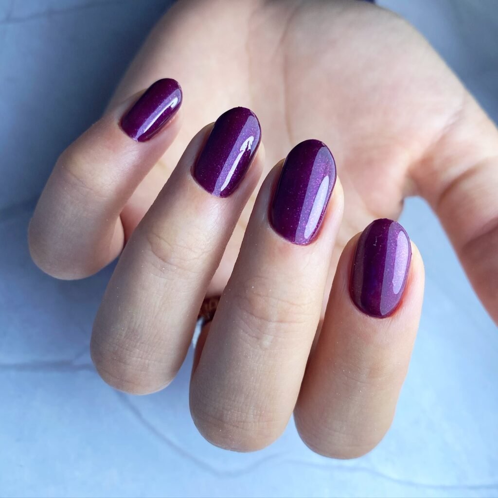 Stylish purple ombre nails with intricate purple nail art designs featuring light purple chrome accents and elegant purple French tips, perfect for both casual and formal looks