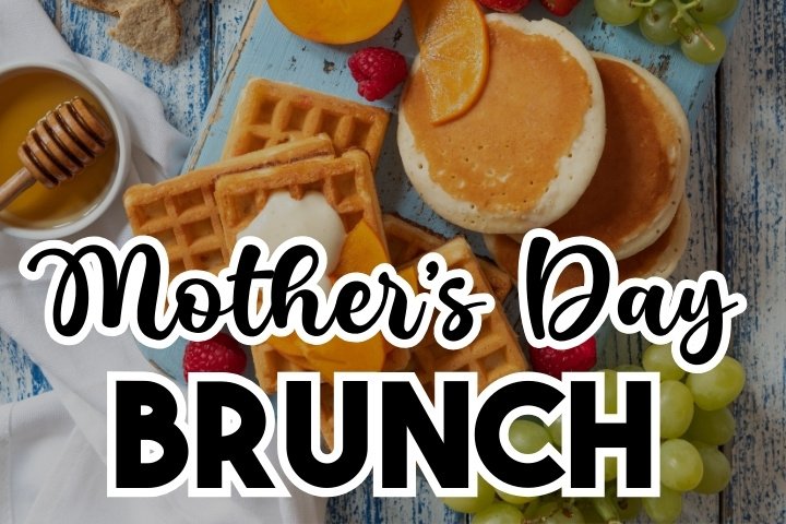 Beautiful Mother's Day brunch table with a variety of dishes, fresh flowers, and a mimosa bar, perfect for celebrating Mom