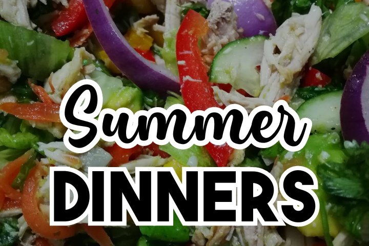 A vibrant table setting showcasing summer dinner recipes, with a focus on healthy summer dinners like grilled vegetables, fresh salads, and light pasta dishes for a warm evening.