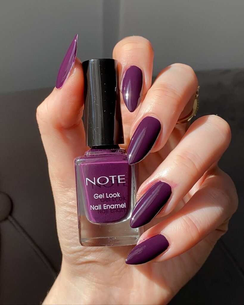 elegant dark purple nails with chrome accents and French tips, perfect for autumn manicure ideas