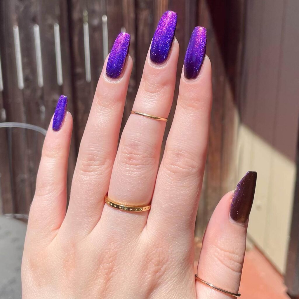 elegant dark purple nails with chrome accents and French tips, perfect for autumn manicure ideas