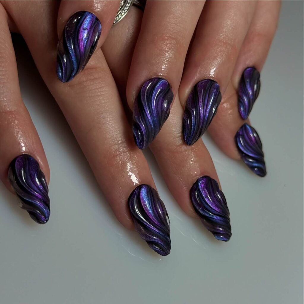 elegant dark purple nails with chrome accents and French tips, perfect for autumn manicure ideas