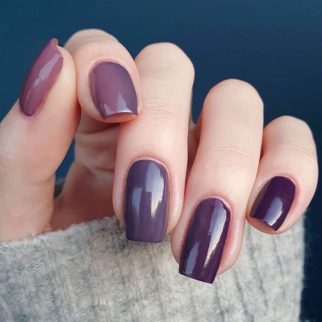 elegant dark purple nails with chrome accents and French tips, perfect for autumn manicure ideas