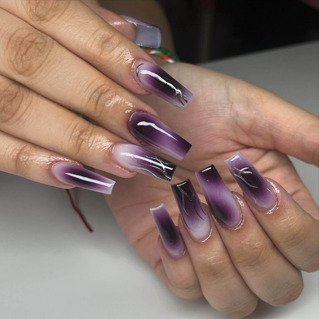 elegant dark purple nails with chrome accents and French tips, perfect for autumn manicure ideas